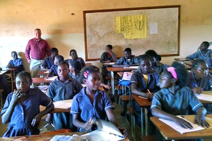 Michael Shumate in a classroom in Zambia