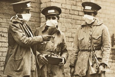 Women conductors in 1918 New York wear face masks to prevent the spread of influenza during the 1918 flu pandemic. National Archives