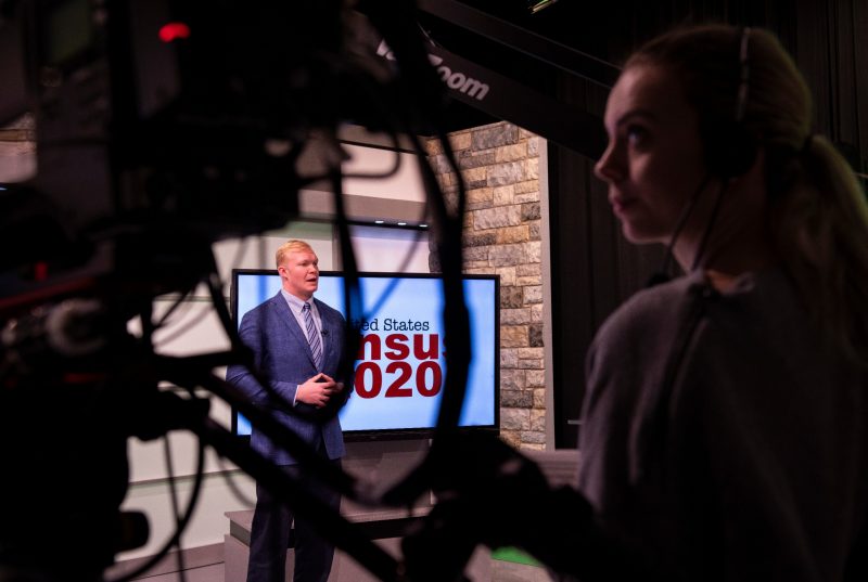 Andrew Webb does a news segment in the Department of Communication’s broadcast studio in the Moss Arts Center. 