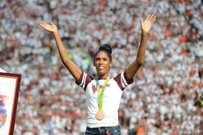 Kristi Castlin was the first female from Virginia Tech to win an Olympic medal, taking bronze in the 100-meter hurdles at the 2016 Summer Games, and she was recognized for that accomplishment at a Virginia Tech football game later that fall.
