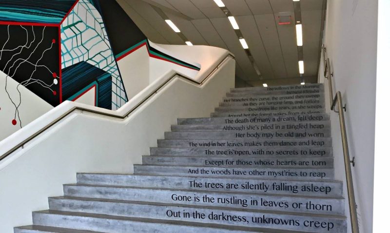 A poem cascades down a Moss Arts Center staircase