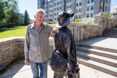Lawrence Bechtel ’85 knows what’s in William Addison Caldwell’s backpack because he created the iconic statue on the Blacksburg campus. Photo by Leslie King for Virginia Tech.