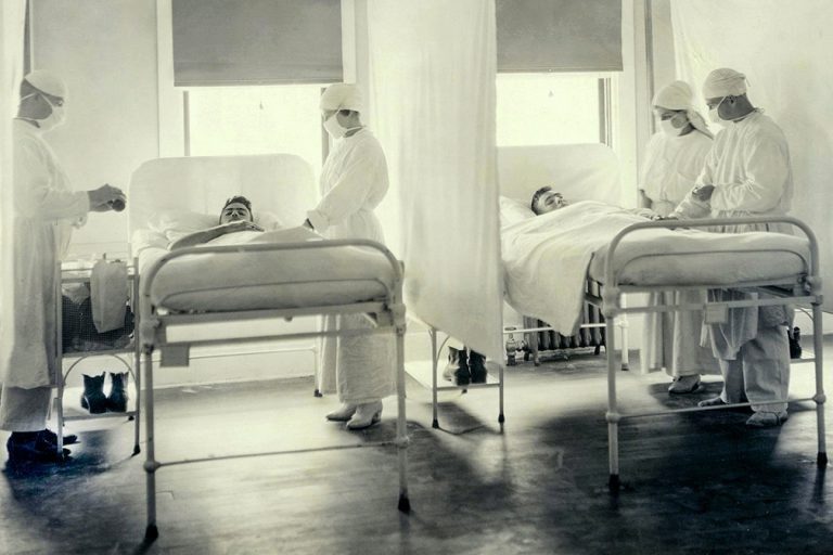 Sailors receive treatment in the influenza ward at Mare Island Naval Base near San Francisco in November 1918. (Courtesy of U.S. Navy Medicine)