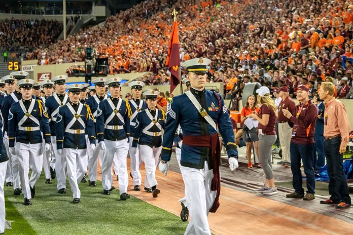 Cadet Brett Smith of the Virginia Tech Corps of Cadets leads Golf Company into Lane Stadium during the pregame ceremonies.