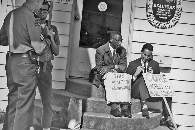 Participants gather for a fair housing protest in Seattle, Washington, in 1964.