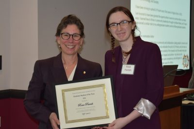Roan Parrish (right) received the Graduate Student of the Year honor during the Graduate School's March awards ceremony. Pictured with Parrish is Aimee Surprenant, dean of the Graduate School. Photo by Cathy Grimes for Virginia Tech.