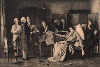 A drawing of several men standing around a piano, with another man sitting in a chair with pillows and a woman and child behind the chair.