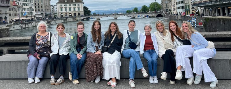 students with instructor on a bridge over canal in Milan, Italy