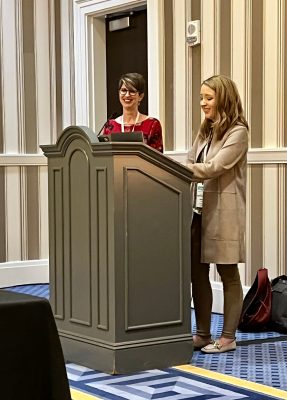 Dr. Catheryn Foster and Dr. Tami Draves presenting “Being a Mom in the Music Education Professoriate: An Autoethnography” at the National Association for Music Education Conference in National Harbor, Maryland (Nov. 2022)