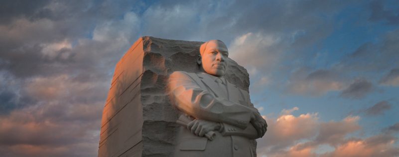 statue of dr. martin luther king in dc at sunset