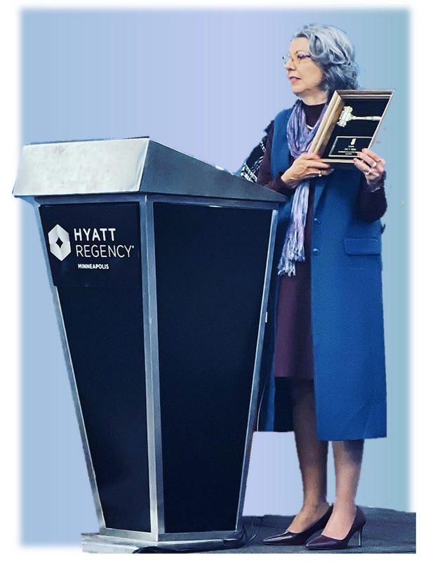 Woman standing at podium