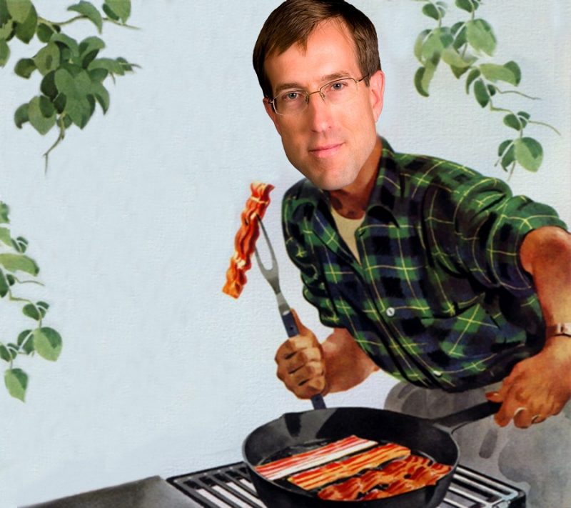 Brian Britt grilling the bacon