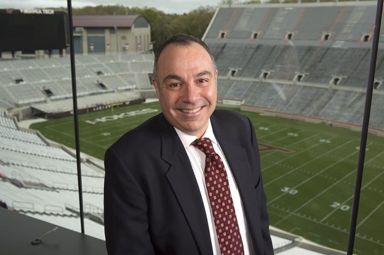 For nearly three decades, Bill Roth served as the Voice of the Hokies, providing play-by-play coverage of Virginia Tech football and men’s basketball. His jubilant call when Hokies crossed the end zone — “Touchdown, Tech!” — became iconic.
