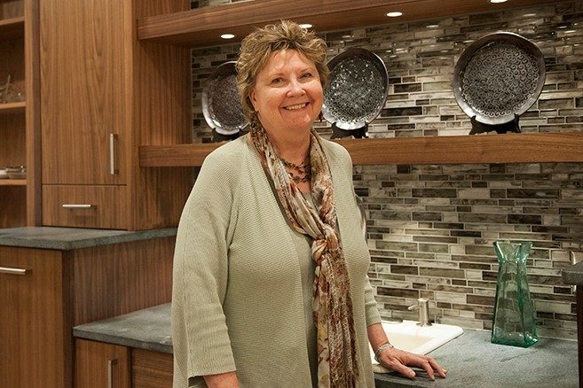 Julia Beamish stands in the Universal Design Kitchen, one of six kitchens featured in the Center for Real Life Design.