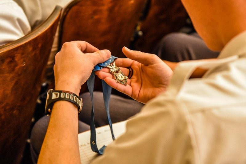 During a 2018 lecture, a cadet takes a close look at a Medal of Honor received by Leroy Petry, a retired U.S. Army master sergeant who received the medal for actions on May 26, 2008, in Paktya Province, Afghanistan.