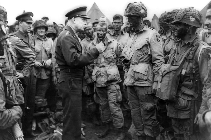 At the Greenham Common Airfield in England, in advance of D-Day in 1944, Gen. Dwight D. Eisenhower gives the order “Full victory; nothing less” to members of the 101st Airborne Division. The general also talked about fly fishing with his men, as he always did before a stressful operation.