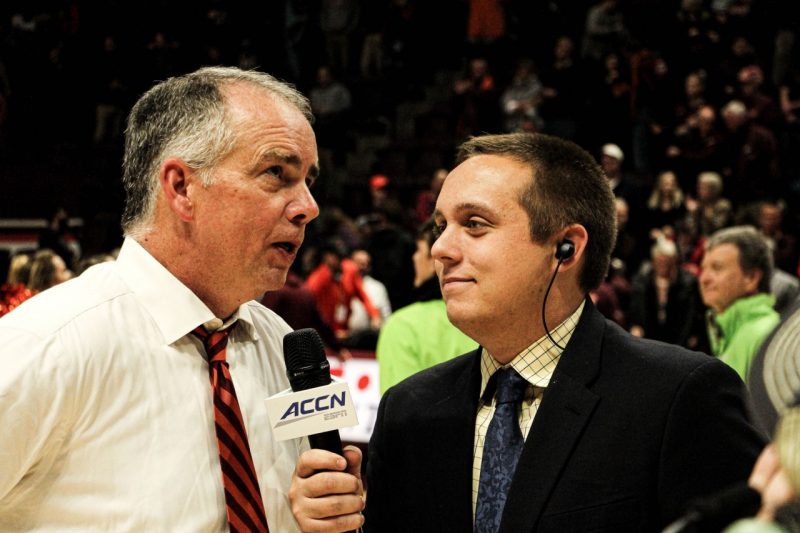 Evan Hughes interviewing Mike Young, the head coach of Virginia Tech men’s basketball