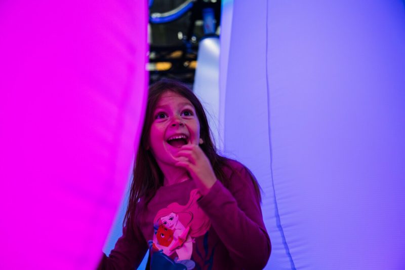 A young visitor to the Smithsonian National Museum of American History explores Celestial Garden, an immersive and interactive audio and visual exhibit created by Virginia Tech faculty members and on display at the ACCelerate Festival.