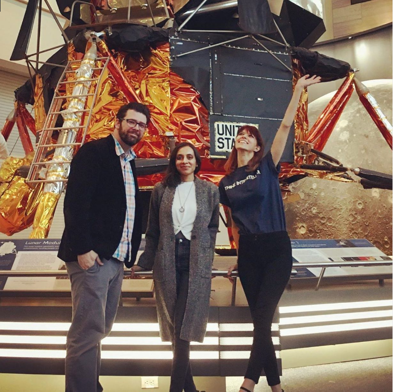 Savannah Mandel with friends standing in front of a space ship