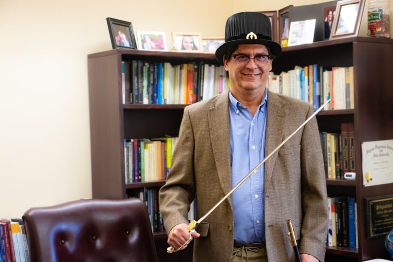 James Hawdon with his doctoral sword and hat