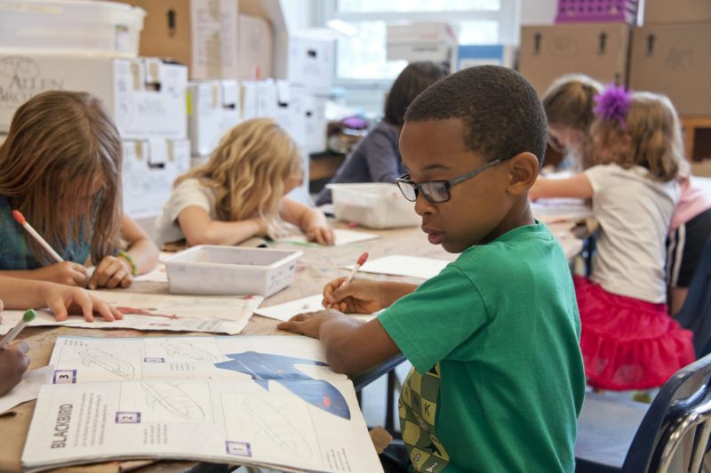children participate in a reading focused classroom activity