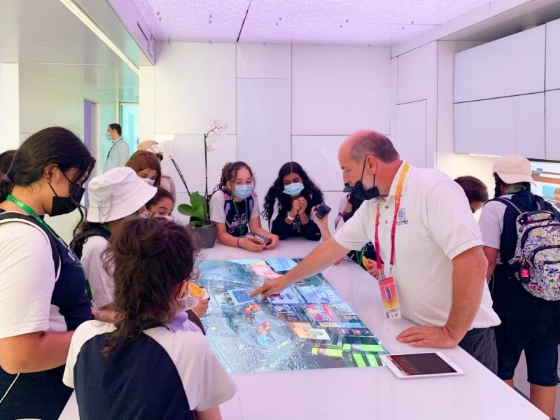 Professor Joseph Wheeler talks about FutureHAUS to a group of schoolchildren touring Expo 2020 Dubai.
