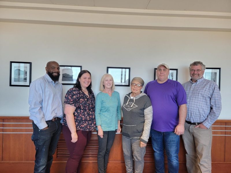 David Moore with staff of TAP's Pathway home program.  Pictured, from left to right, are Jason Hariston, Jennifer Miller, June Bentley, Carolyn Coles, Christopher Chalk, and David Moore. Photo courtesy of David Moore.