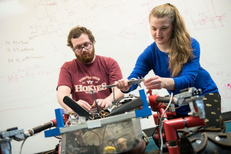 Two Virginia Tech students work on a research project at the Center for Space Science and Engineering
