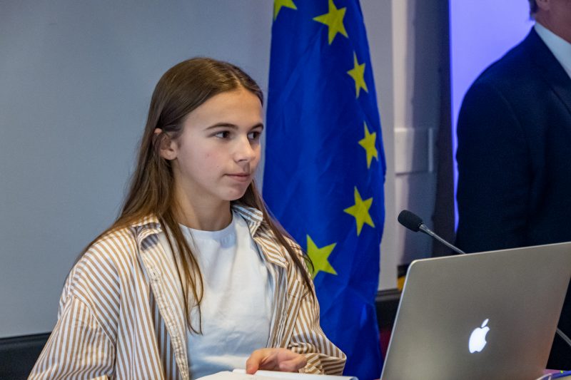 Model EU Council - Young female student presenting